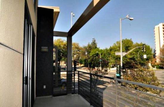 Cinema Lofts balcony offers city views of Pasadena.